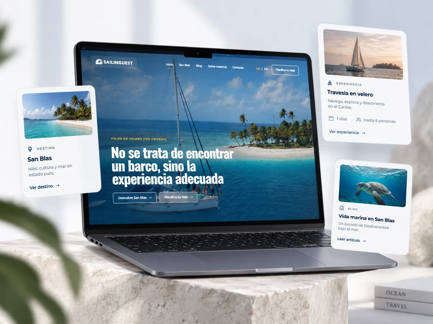 Web de Sailinguest en un portátil con contenido de destinos, experiencias y blog